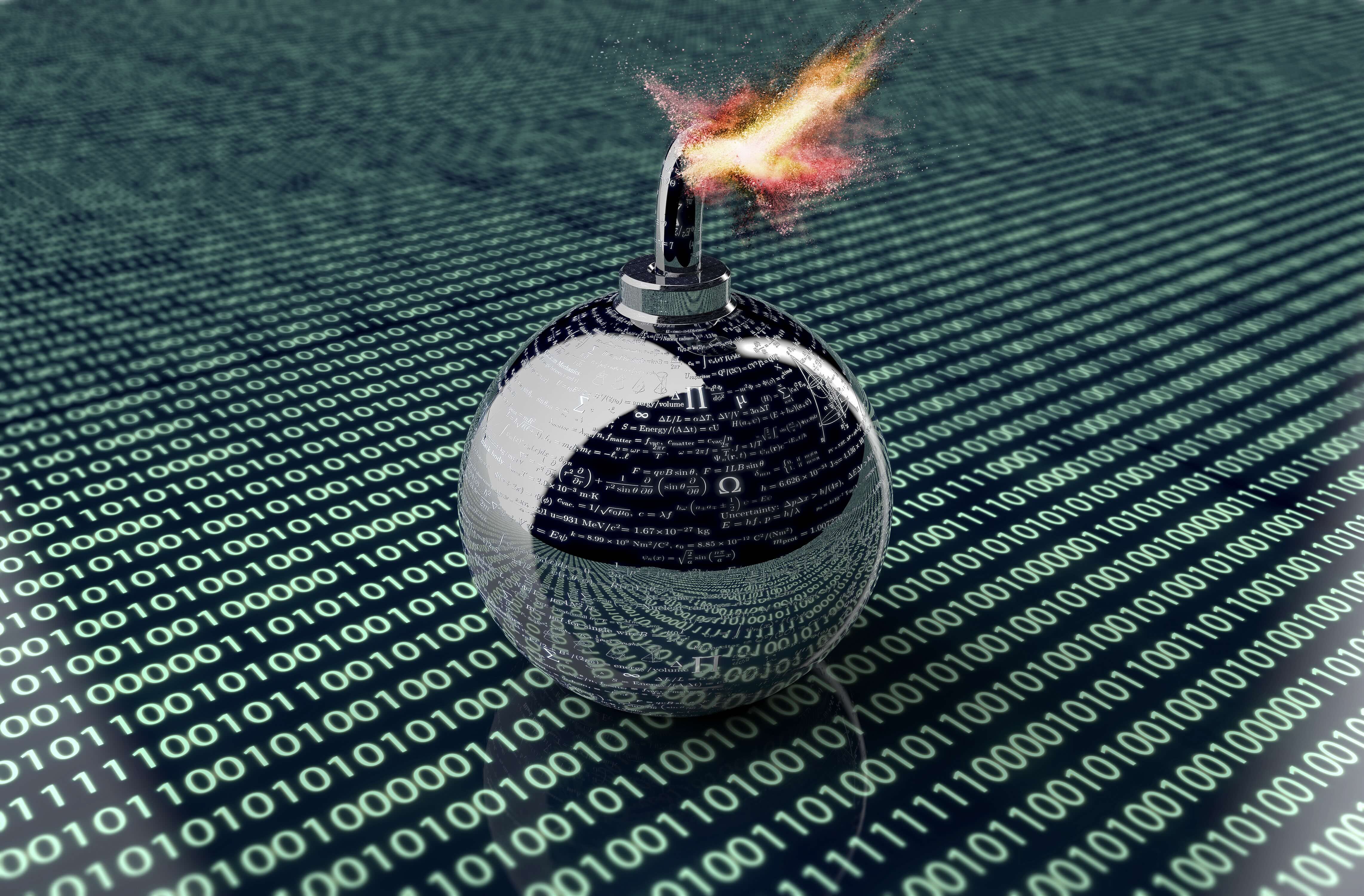 An image of a lit explosive device on top of lines of code