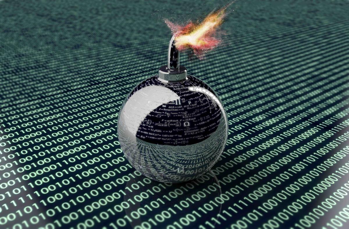 Illustration of a spherical bomb with a lit fuse placed on a surface of ones and zeroes illustrating binary computer code