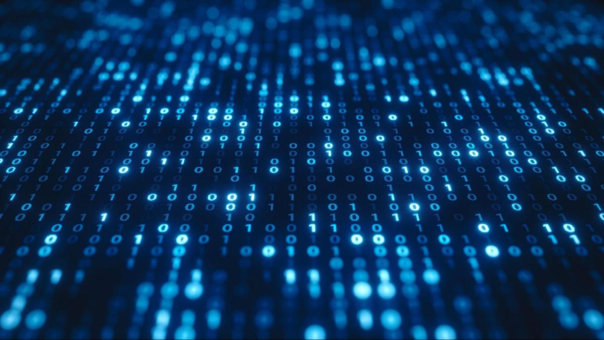 Image of blurry number ones and number zeroes illustrating binary code